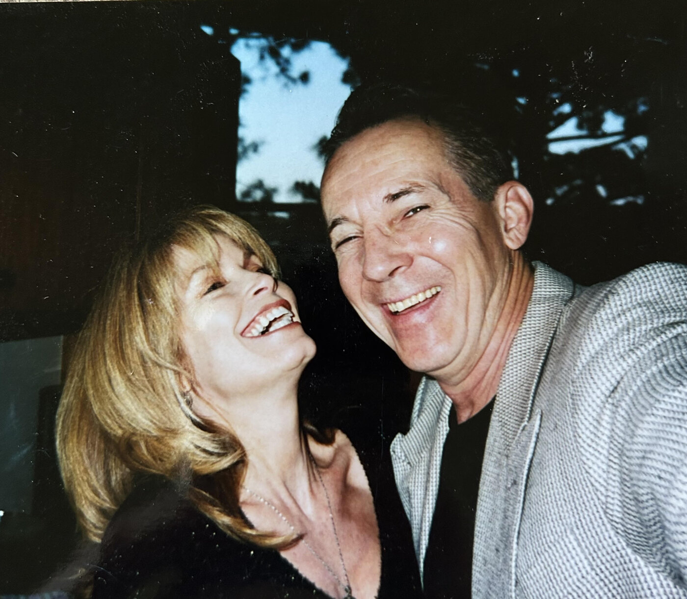 Joseph laughing with Jennifer